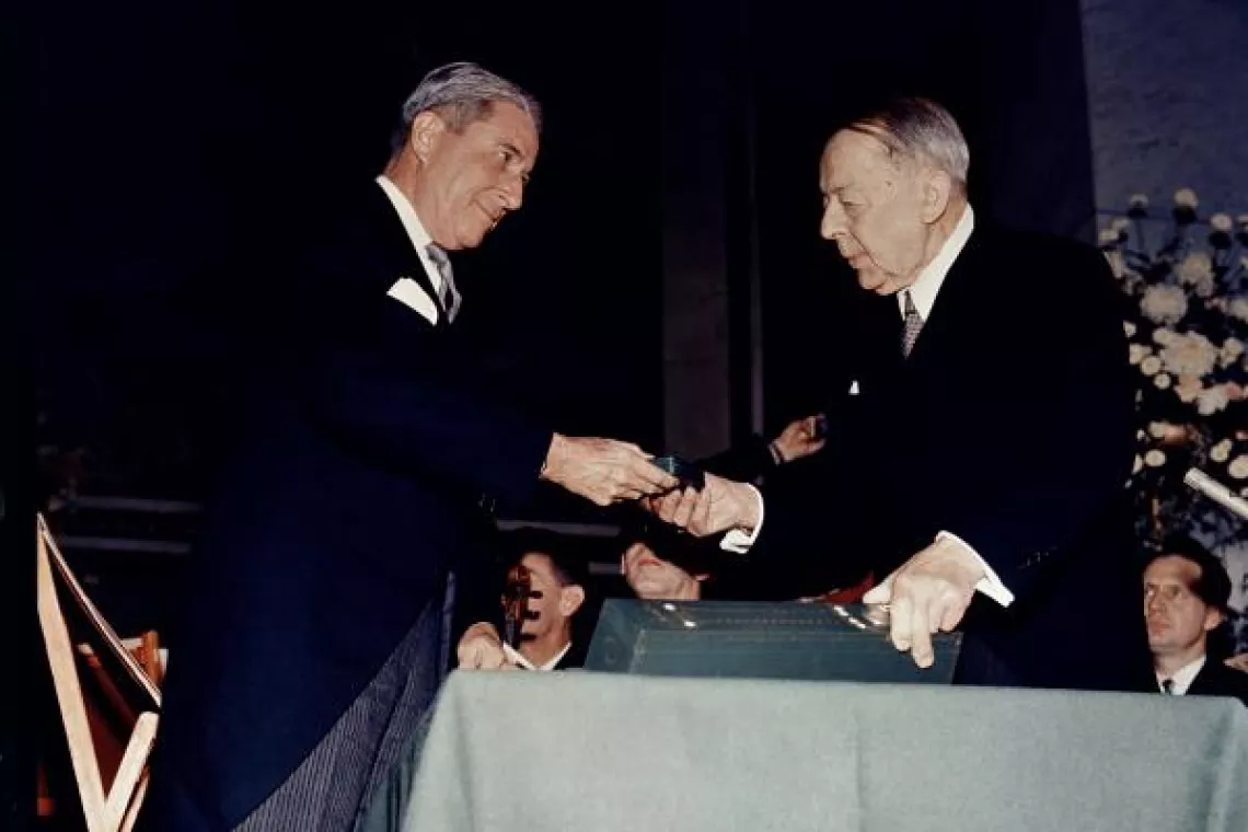 Henry Labouisse receives the Nobel Peace Prize medal on behalf of UNICEF. Norway, 1965.