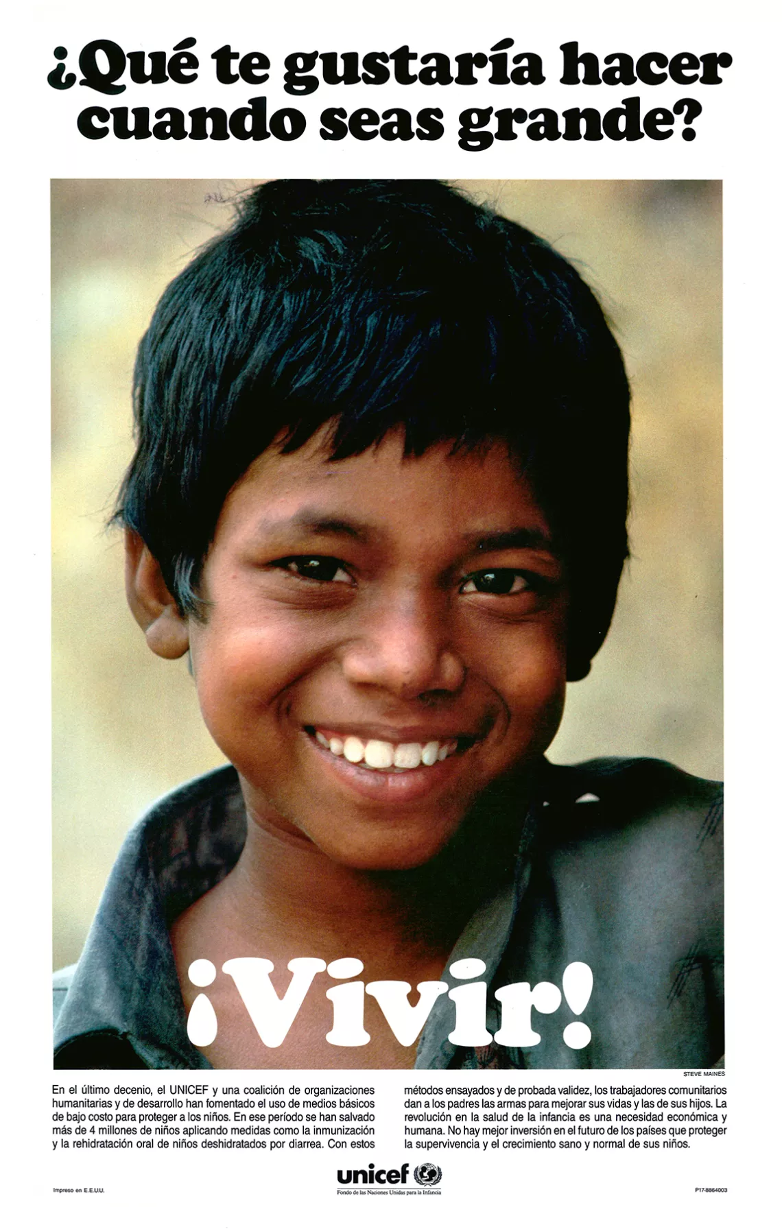 A smiling boy on a UNICEF poster from the 1980s.