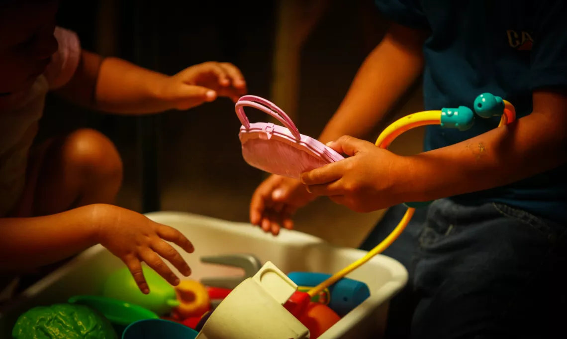 Children play with toys, El Salvador