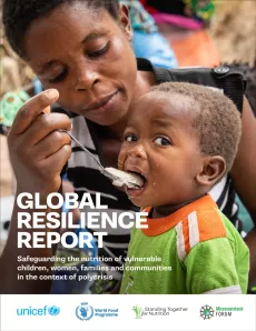 cover photo of child being fed