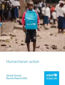 A 10-year-old schoolboy carries his new UNICEF schoolbag
