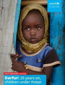 Sudan. A girl stands at a camp for displaced persons.