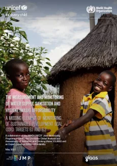 Two children wash their hands
