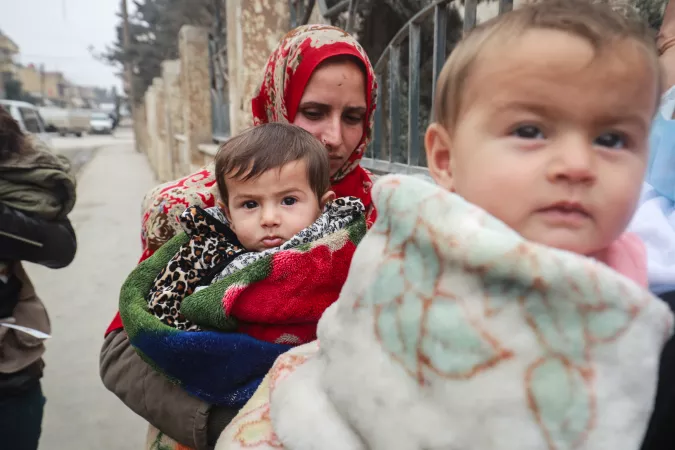 Internally displaced mothers bringing their children to the UNICEF -supported health and nutrition mobile clinic for consultation and distribution of medicine at Musab Bin Omair mosque, Tal Hajar, Hasakah city, northeast Syria on 27 January 2022. The mosque is currently a shelter for some 120 families displaced as part of thousands of people forced to flee.