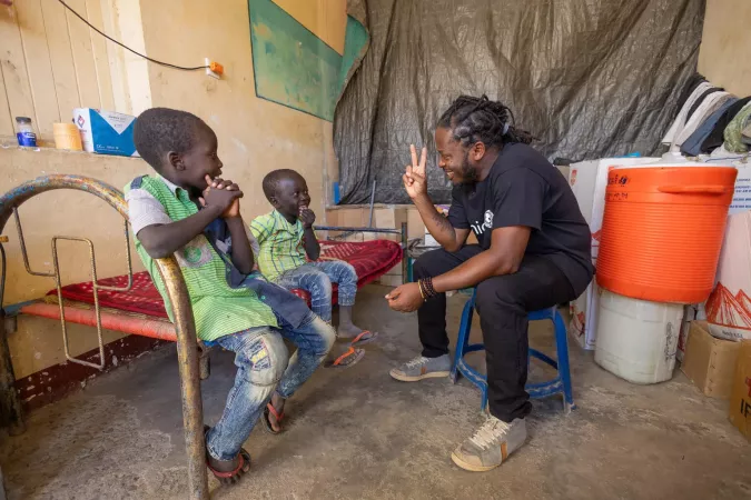 On 2 December 2024, Ishmael Beah, UNICEF goodwill ambassador, meets children in Port Sudan.