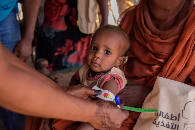 On 2 December 2024, health volunteers screen children for malnutrition and provide vitamin A and deworming tablets during a UNICEF-supported door-to-door nutrition campaign in Aroma locality, Kassala state.