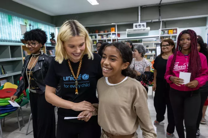  UNICEF Goodwill Ambassador Millie Bobby Brown speaks with 11-year-old student Catarina Moura Dias while visiting a school in S&atilde;o Paulo, Brazil
