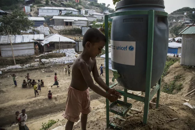 Bangladesh. A boy washes his hands in Cox's Bazar district.