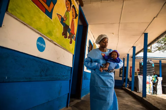 Democratic Republic of Congo. A woman holds a child.