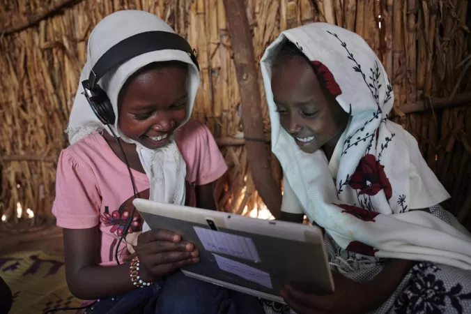 Children use their tablet and work with each other at the UNICEF supported Debate e-Learning Centre in a village on the outskirts of Kassala, the capital of the state of Kassala in Eastern Sudan.