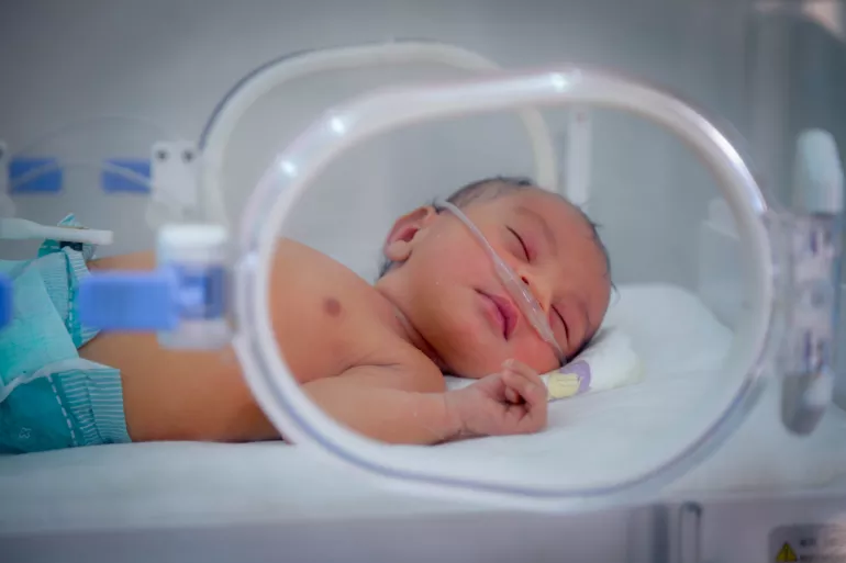 A newborn baby girl born on 31 Dec 2018 lies in nursery at 22 May Hospital in Dolaa Hamdan, Sana'a Governorate. More than four years of armed conflict in Yemen have served to worsen the situation of women and children at birth within a country that was already the poorest in the Middle East and one of the world&rsquo;s most impoverished even before the war escalated early in 2015. 