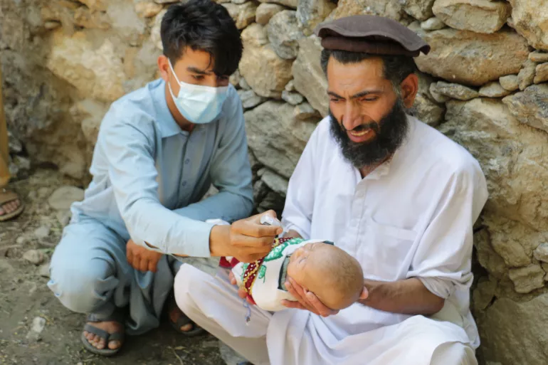 Children are being vaccinated against polio during the resumed polio vaccination activities in Jalalabad, Afghanistan.