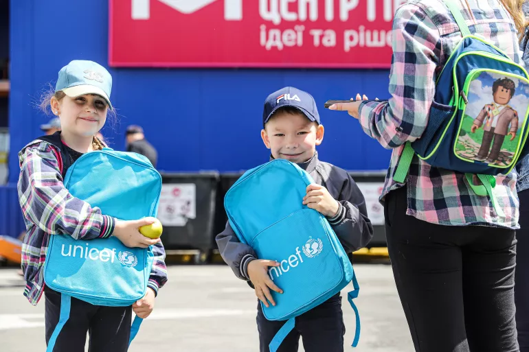 Children who were forced to flee their homes due to the hostilities receive UNICEF backpacks and other items at a reception centre in Zaporizhzhia, 24 May 2022.