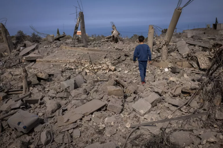 On February 22, 2024, friends of Hassan Al Durr, a 5-year-old girl killed in an airstrike, visit the aftermath of the deadly airstrike that claimed her life. Majdal Zoun, Southern Lebanon.