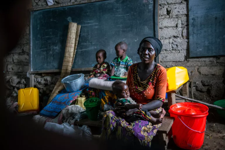 Jeanine Furaha found refuge in a site for displaced people in Kalengera with her three children after fleeing armed clashes in North Kivu province in DR Congo