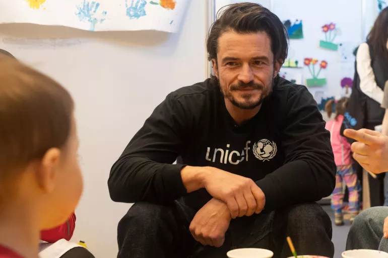 UNICEF Goodwill Ambassador Orlando Bloom talks to children at Moldexpo centre in Chișinău, Moldova. 