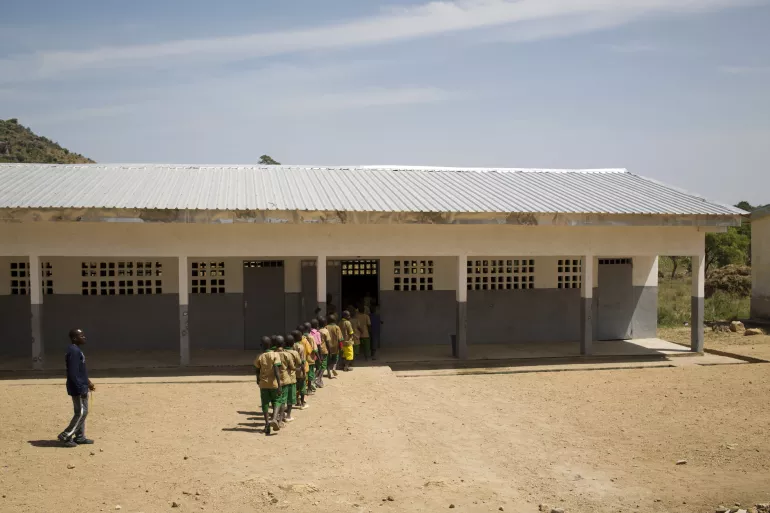 Children enter a school in Cameroon