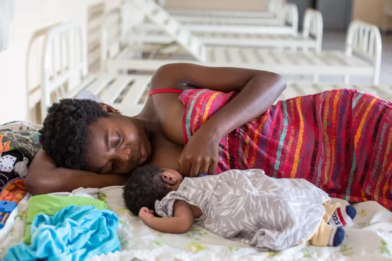 A mother breastfeeding her newborn child - Democratic Republic of Congo
