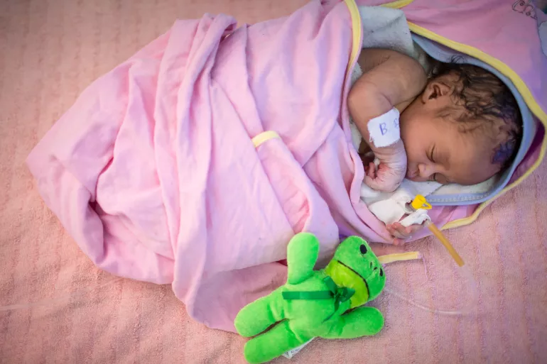 A newborn infant receives specialised care at the UNICEF-supported Neonatal Intensive Care Unit.