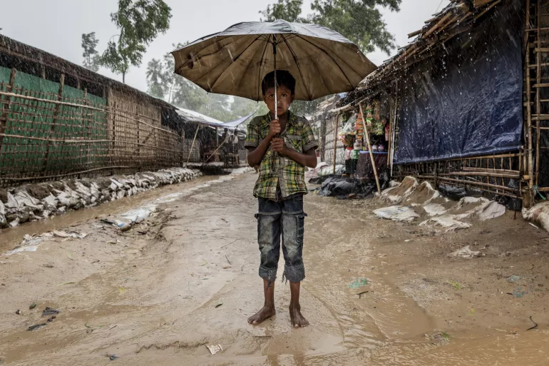 A boy stands in a Rohingya refugee camp in Bangladesh 