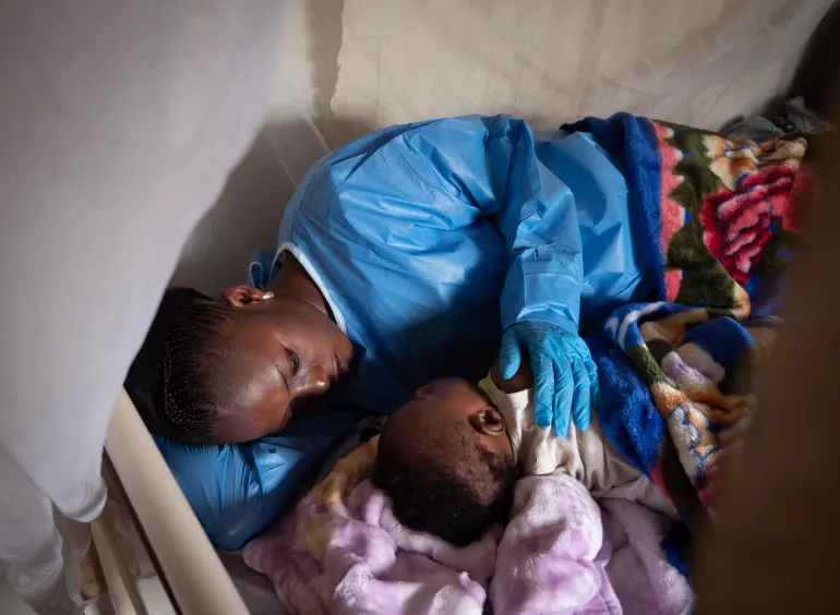 An Ebola survivor and baby in eastern Democratic Republic of Congo.