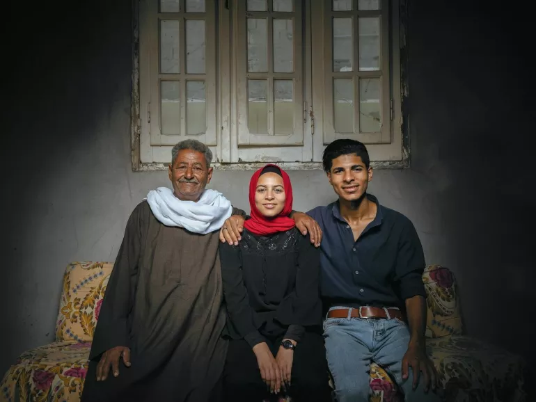 Noura with her brother and father in Egypt. 