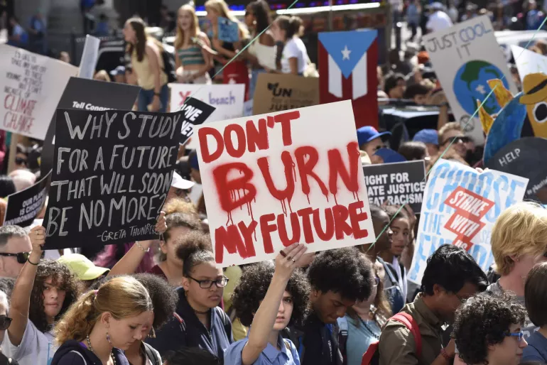 Youth climate activists join in a demonstration calling for global action to combat climate change.