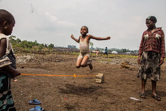 Maliamu, 9, skips at the UNICEF-supported child-friendly space in the Bushagara site for displaced people in North Kivu province, DR Congo, on 15 August 2024.