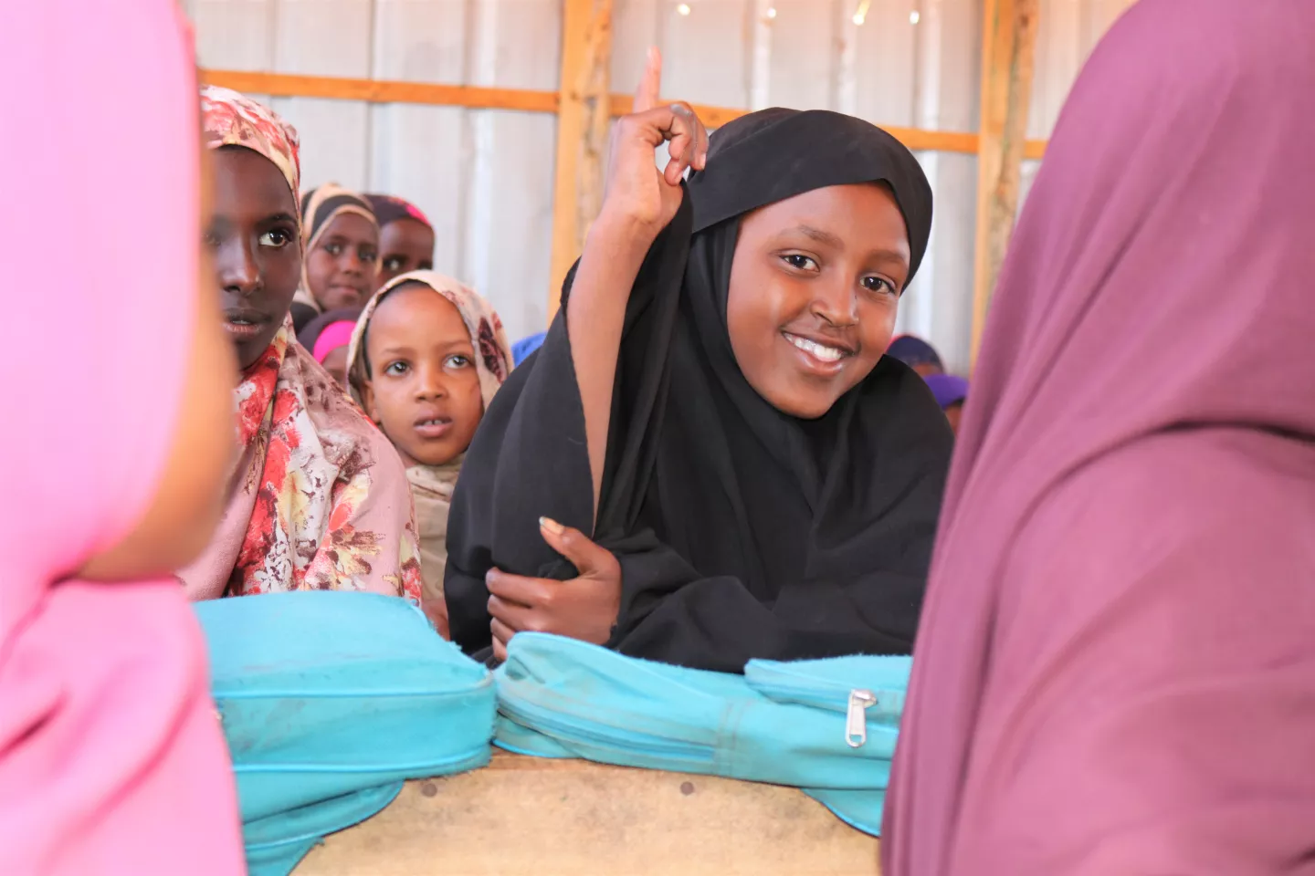 Fatuma rasing up her hand