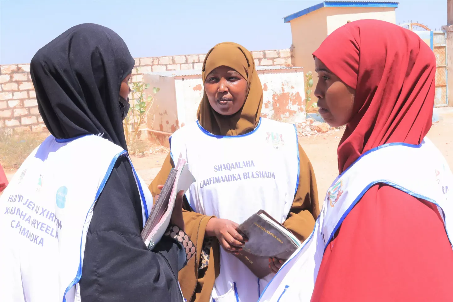 Hawa together with her colleagues
