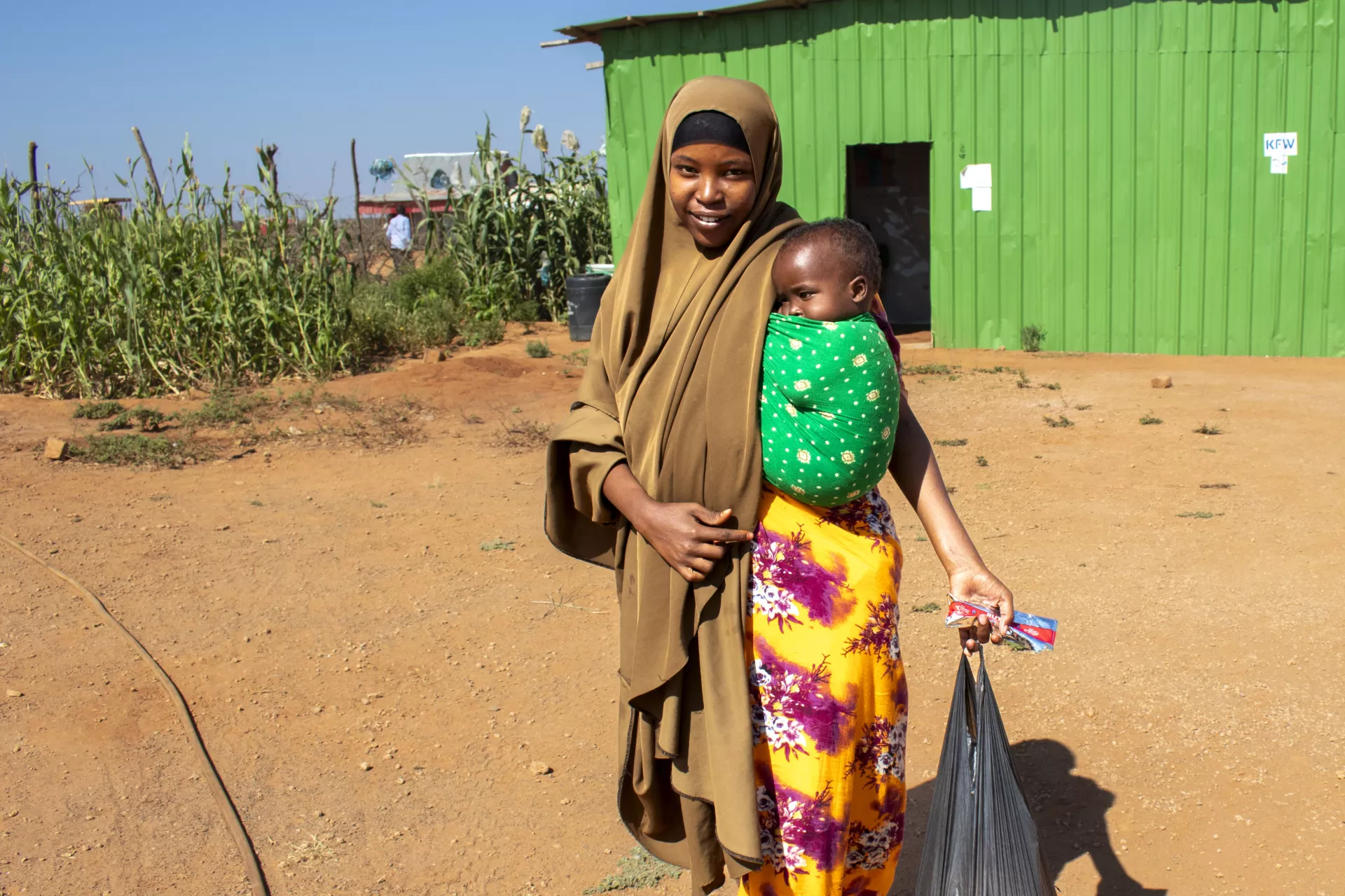 Baby Fahia is recovering from malnutrition through the Joint Resilience Programme support.
