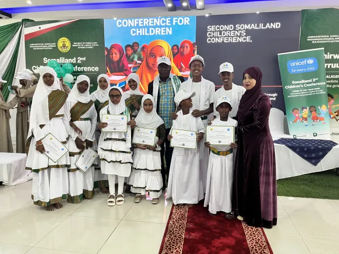 Children receive recognition certificates during the Second Somaliland Children's Conference in Hargeisa, highlighting the importance of meaningful child participation in shaping policies and decisions that affect their lives.