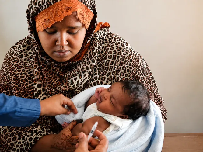 Rahma Abdirahman holds her 40-day-old son, Arafat Moulid, during a routine immunization visit at Edna Adan Teaching and Referral Hospital in Hargeisa, Somaliland.