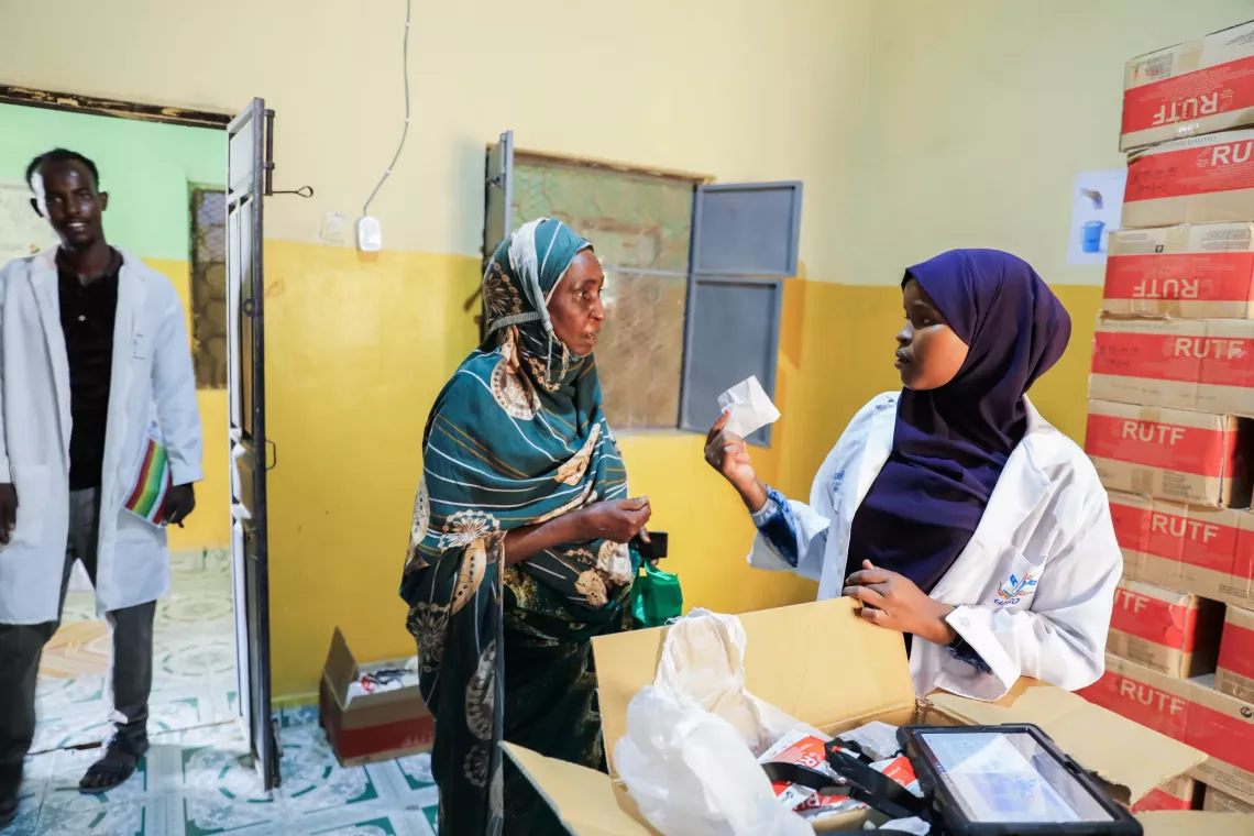 A mother being served at the health centre