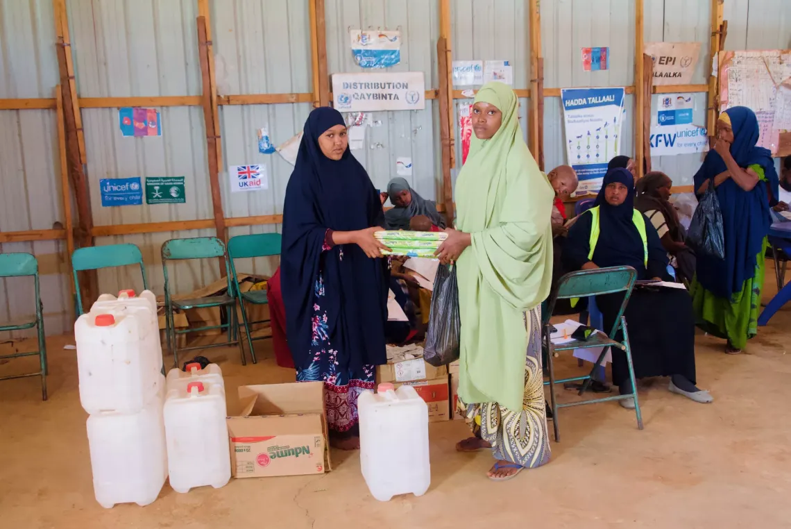 Hygiene kits are given to caregivers.