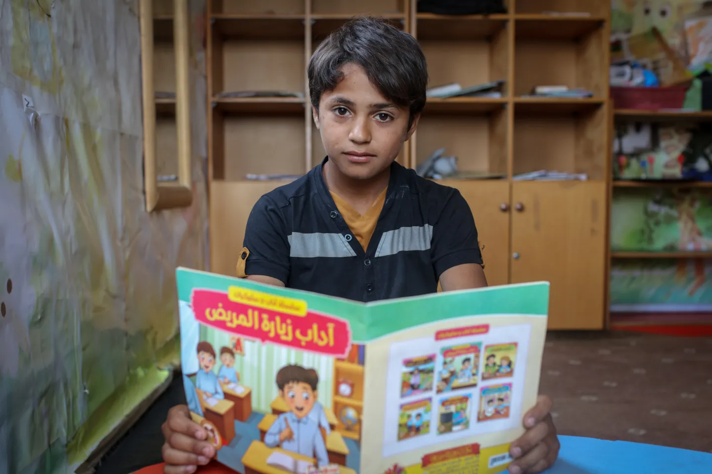 Boy reading book