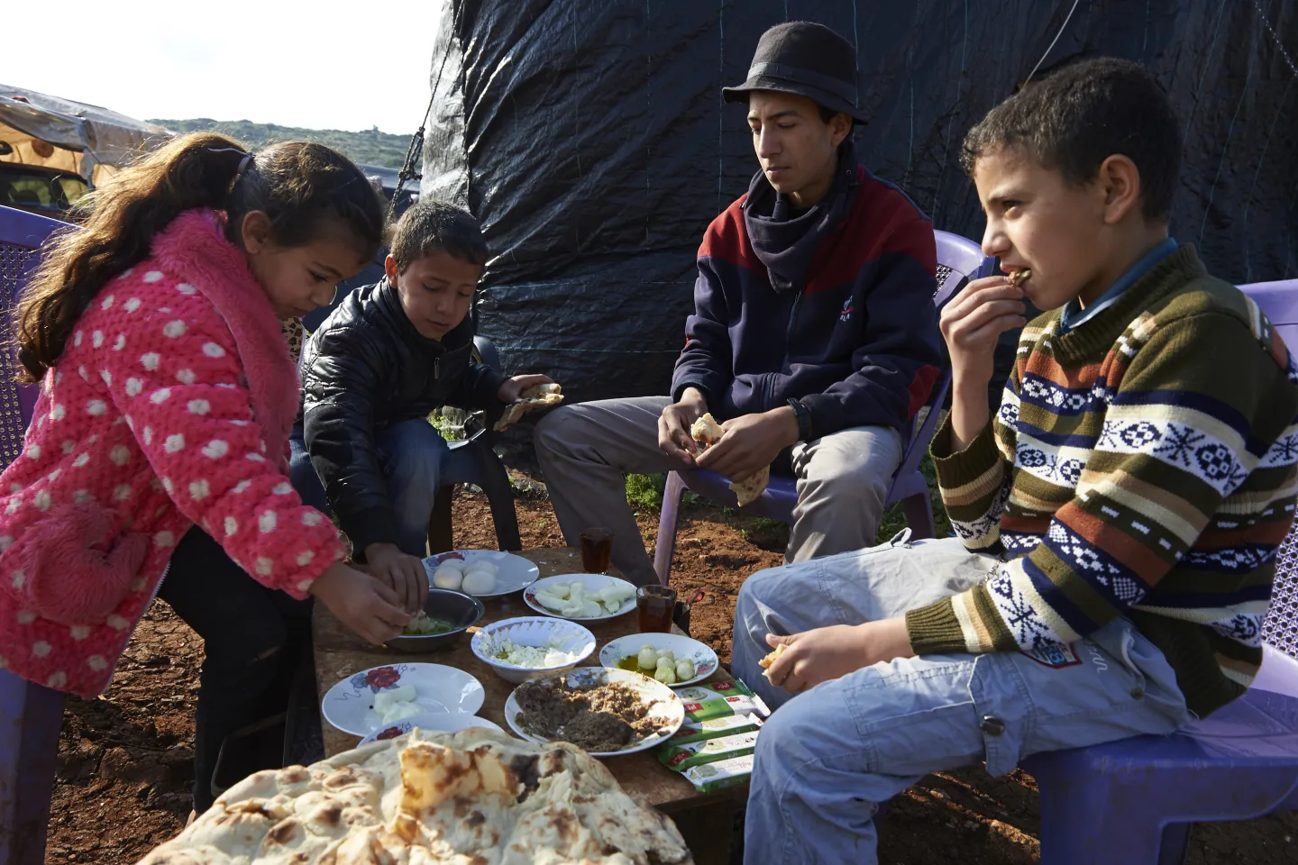 Children having breakfast before school