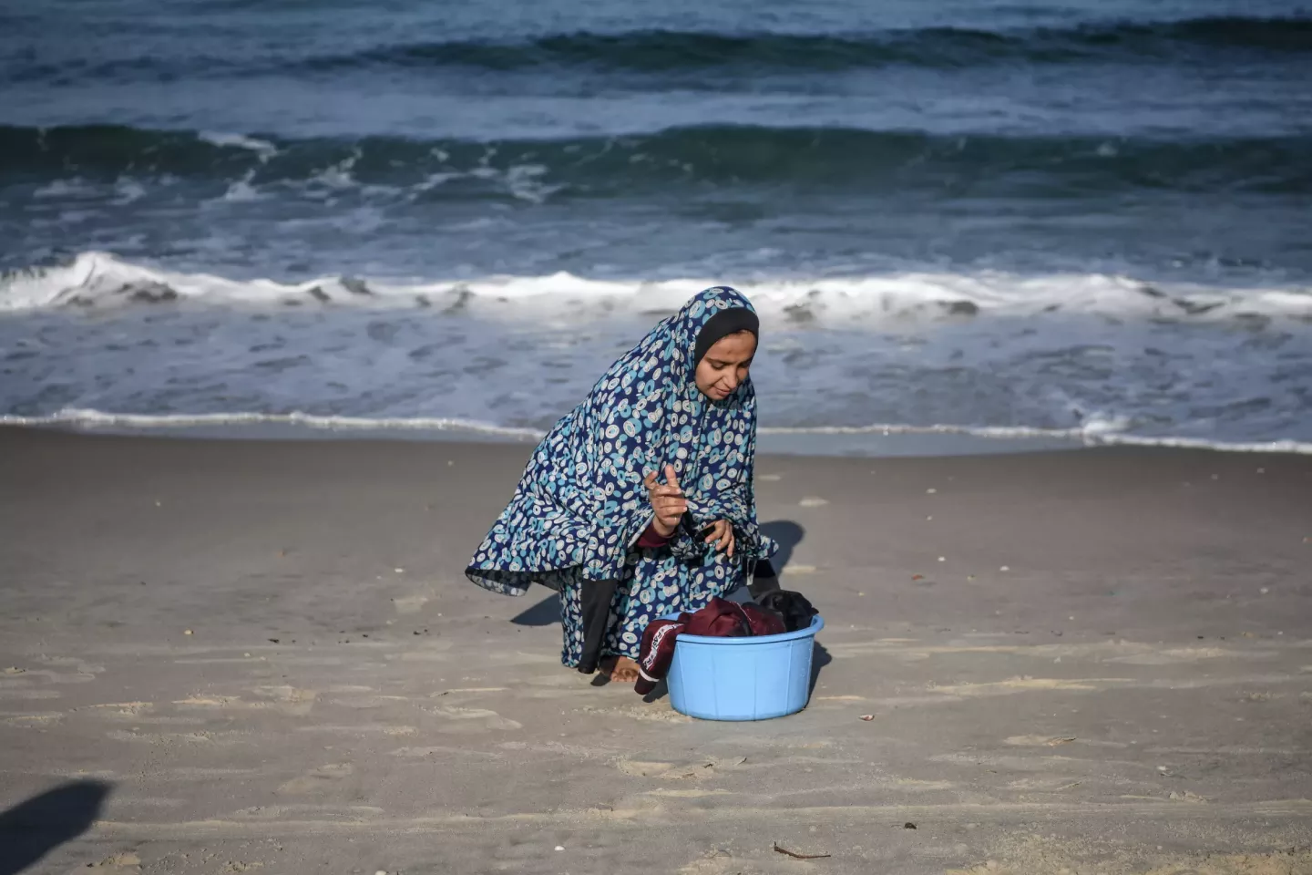 Woman washing clothes