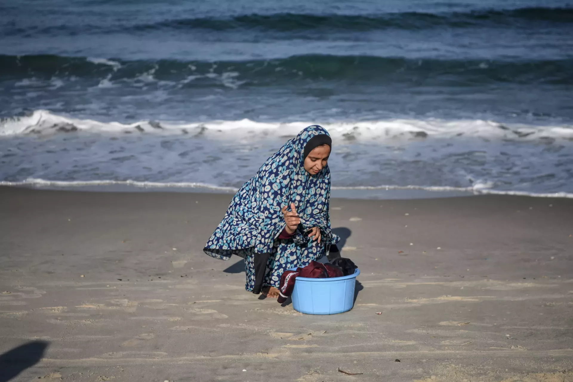 Woman washing clothes