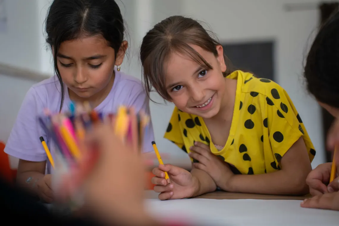 Jana, 8, has hopes of becoming a hairstylist but worries about the violence that she sees around her. 