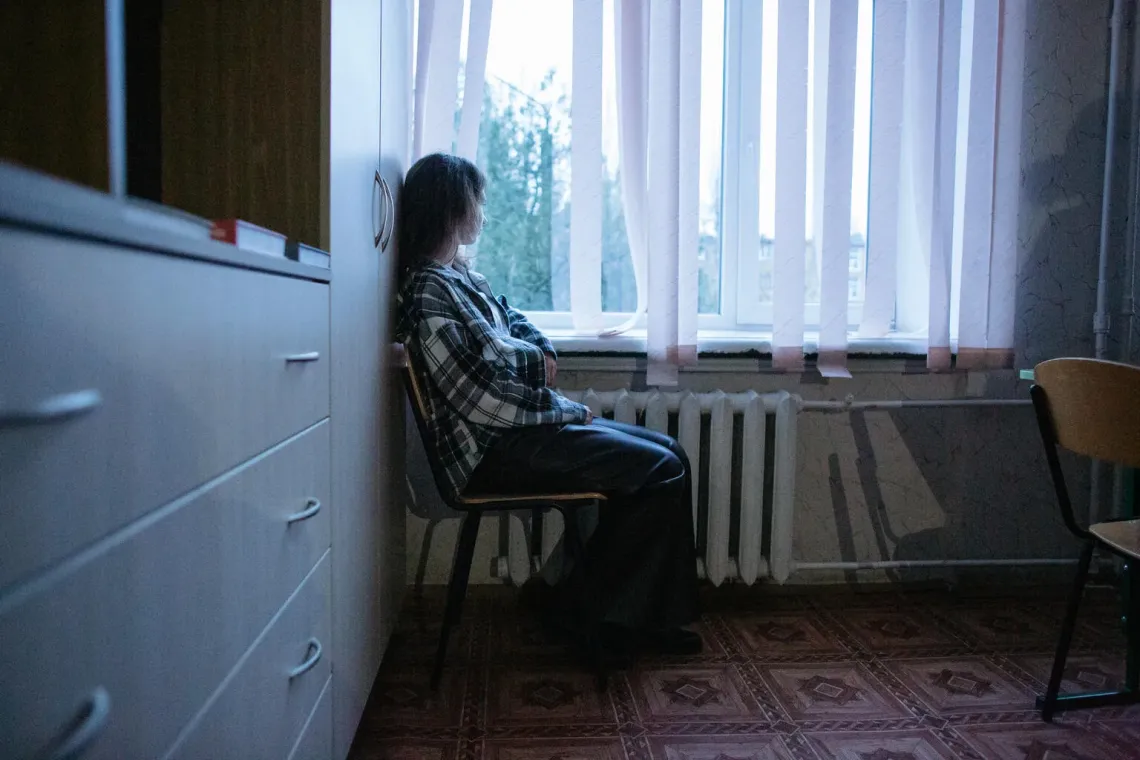 Ukraine. Nastia sits in her classroom in Mykolaiv after returning to in-person learning following years of remote education during the war. 