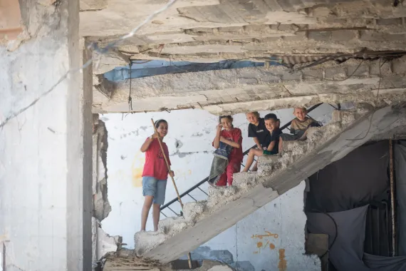 Children in destroyed house