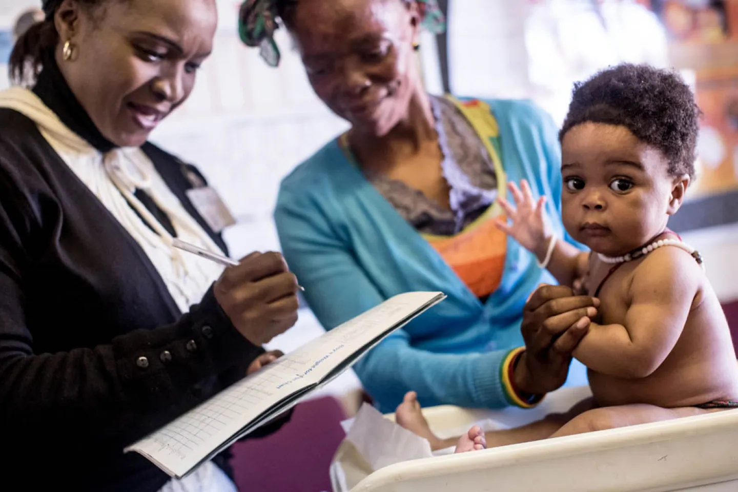 infant-getting-weighed
