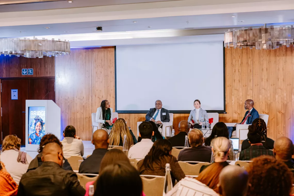 Speakers from UNICEF South Africa, BMW Group South Africa and the Department of Basic Education engage in a panel discussion at the Critical Thinking Forum.