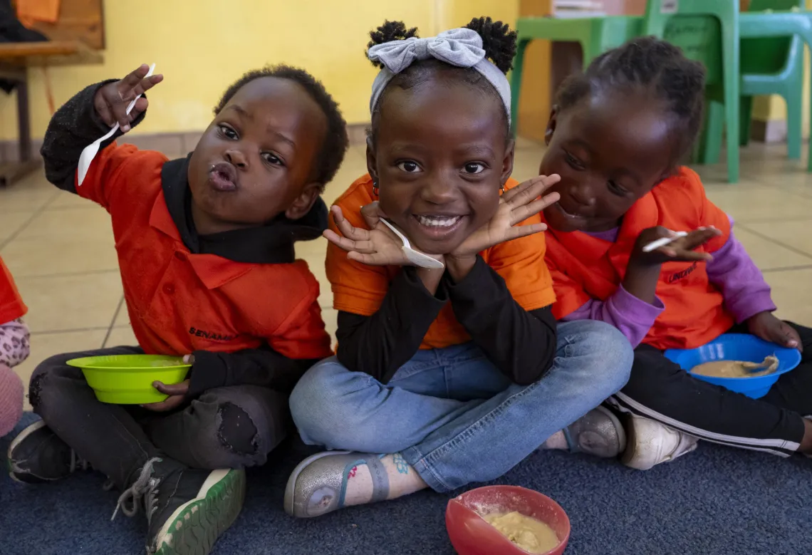 Children enjoy meal time.