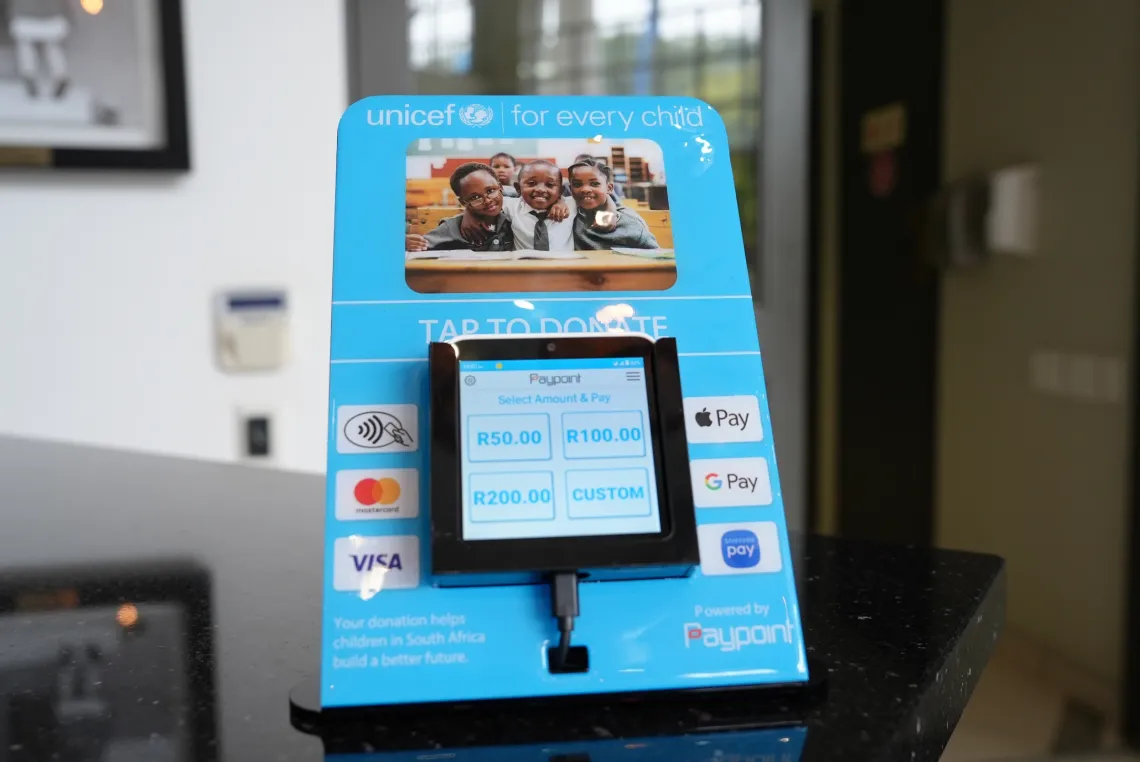 The UNICEF South Africa tap to donate point of sale device.