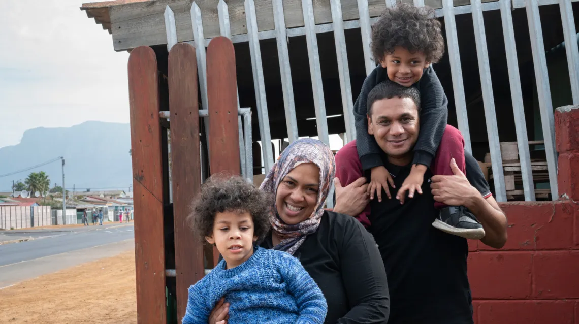 family-outside-their-house