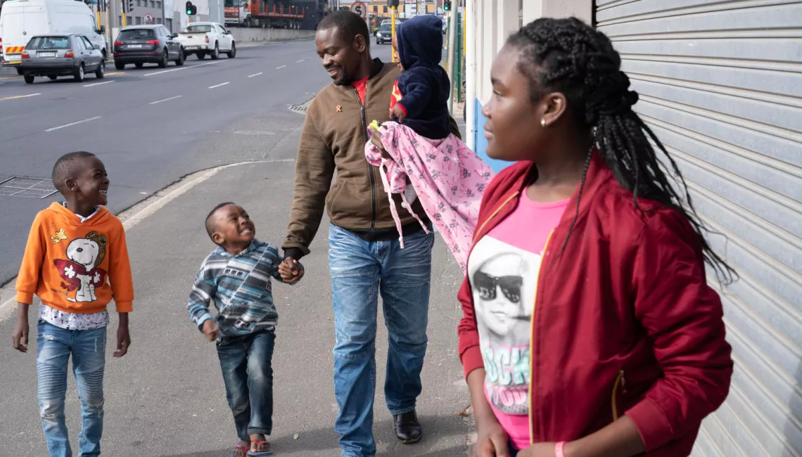 dad-and-children-walking