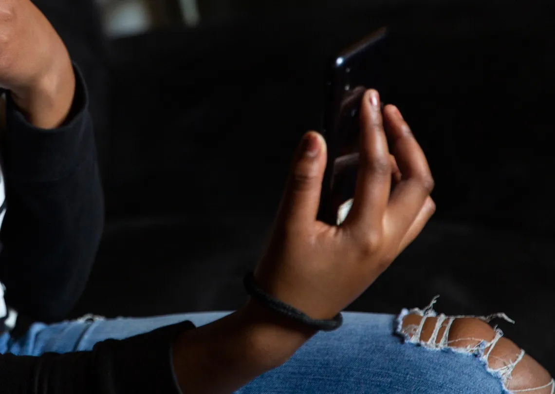 hand-holding-mobile-phone