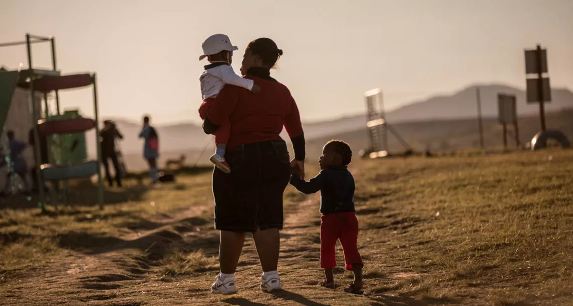 woman-walking-with-children
